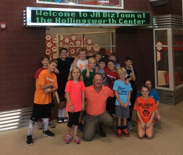 Joe Hollingsworth with children at JA BizTown of the Hollingsworth Center